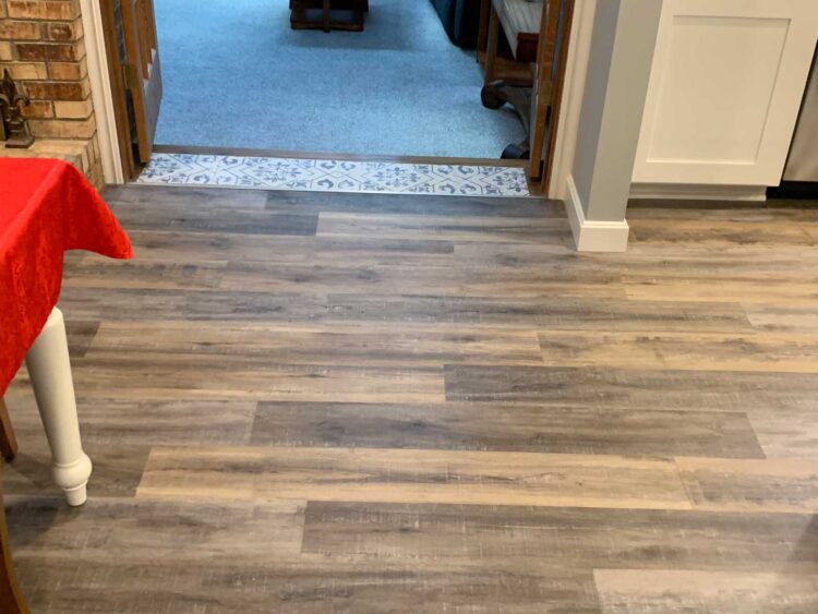 Wood-look LVP flooring installation in a Howland Center, OH home