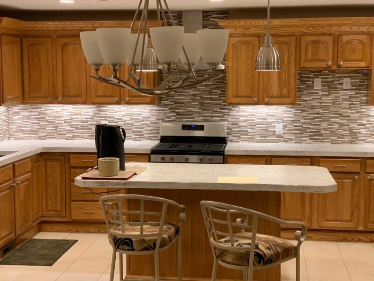 Kitchen island with pendant lighting from a kitchen remodeling project in Poland, OH