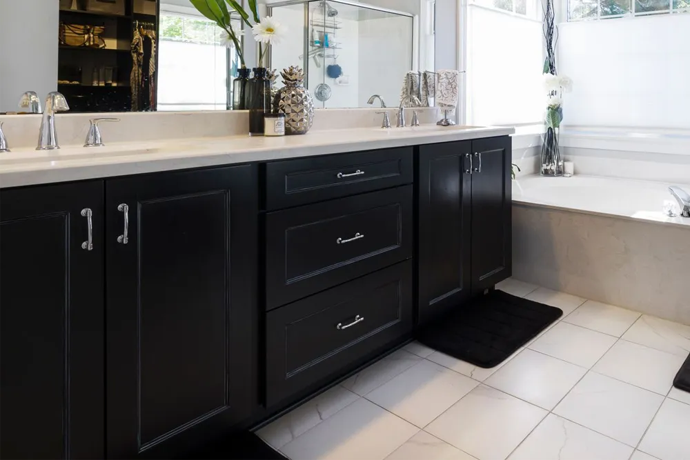 Black bathroom cabinets that were installed as part of bathroom renovations in Girard, OH