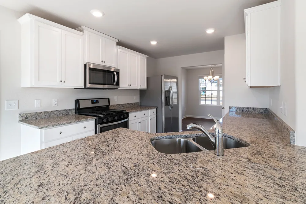 A completed granite countertop installation in Howland Center
